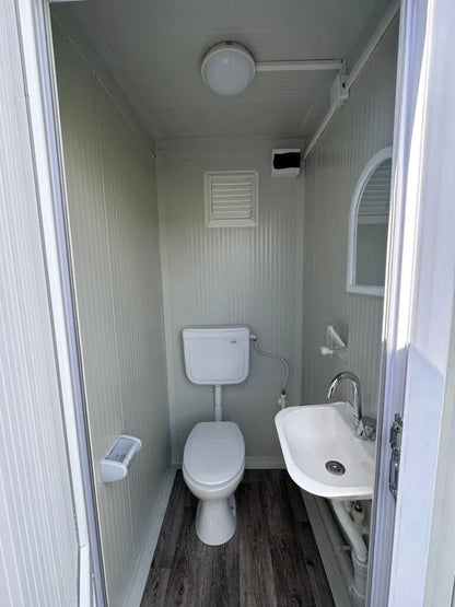 Doppel-Sanitärcontainer 2,20 × 1,30 m mit 2 WCs und 2 Waschbecken